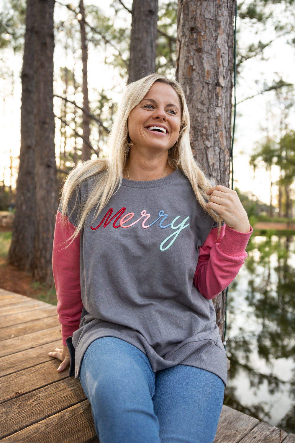Cozy gray long-sleeve shirt featuring 'Merry' in colorful embroidery, perfect for holiday wear.