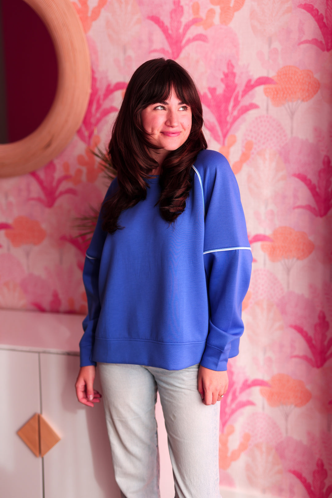 Cozy blue sweatshirt for women, featuring relaxed fit and soft fabric, perfect for casual outings.