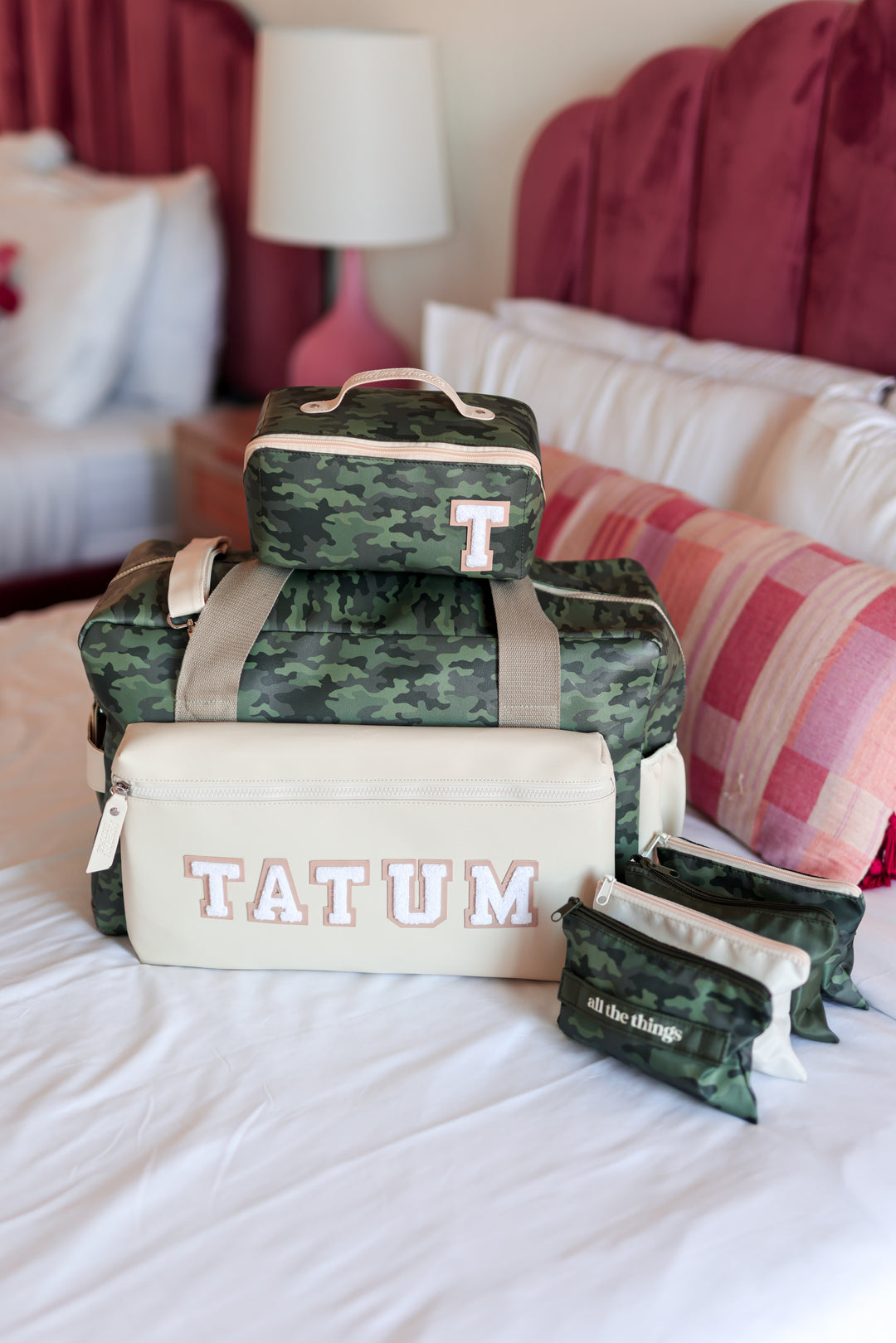 Camouflage travel set including duffel bag and pouches, personalized with 'TATUM' and initials.