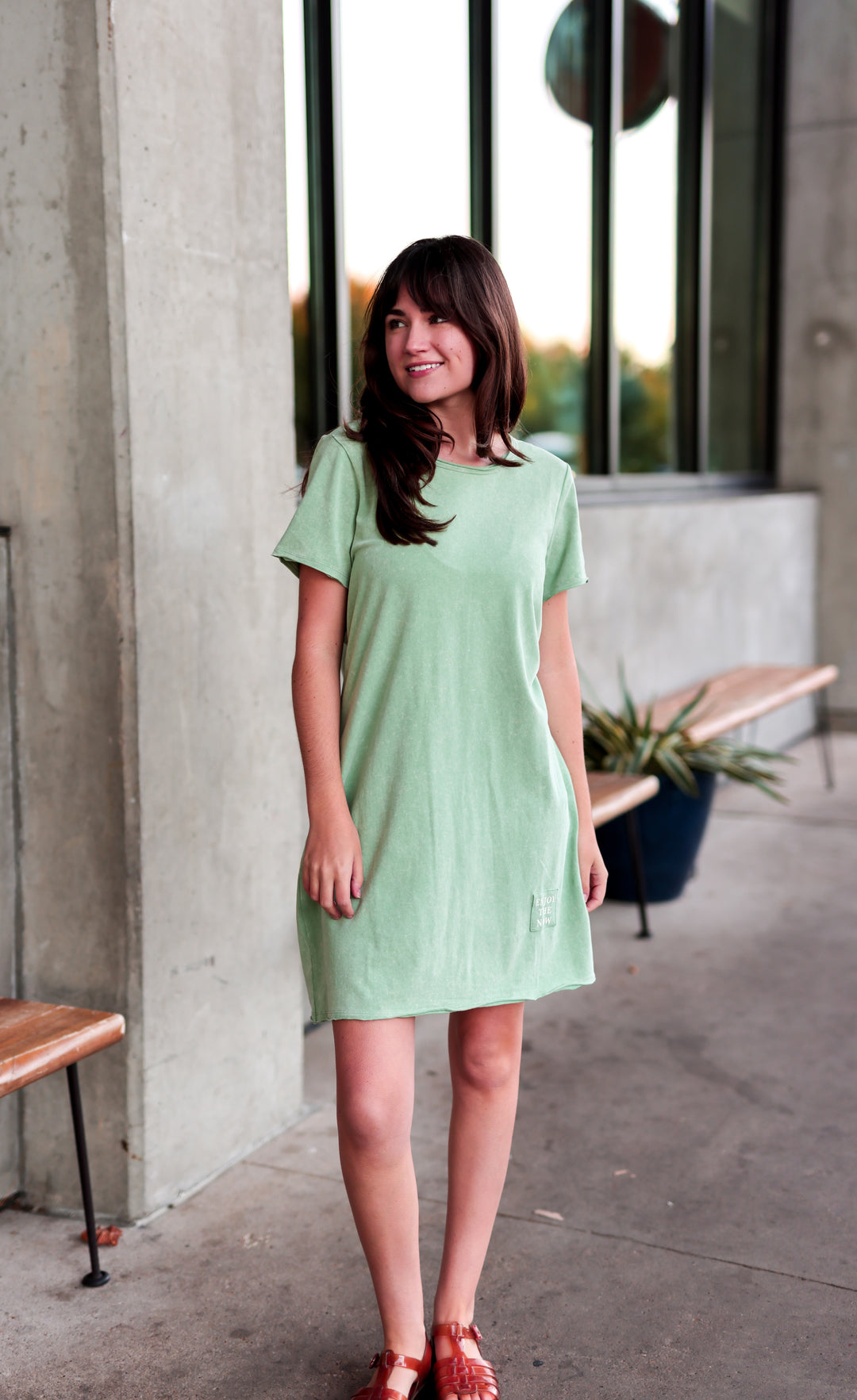 Light green casual short-sleeve dress made of soft material, perfect for summer outings.