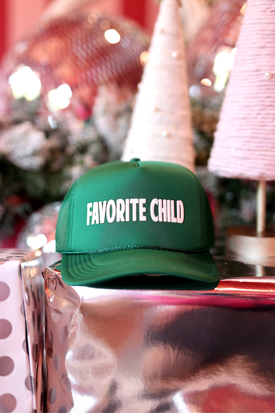 Green snapback cap with 'FAVORITE CHILD' text, perfect for casual wear and gifting.
