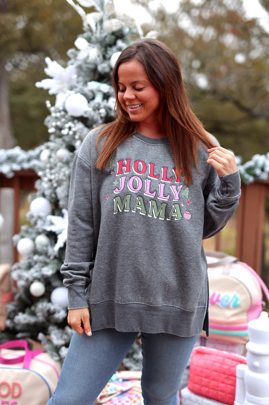 Gray sweatshirt with 'Holly Jolly Mama' graphic, perfect for festive casual wear.