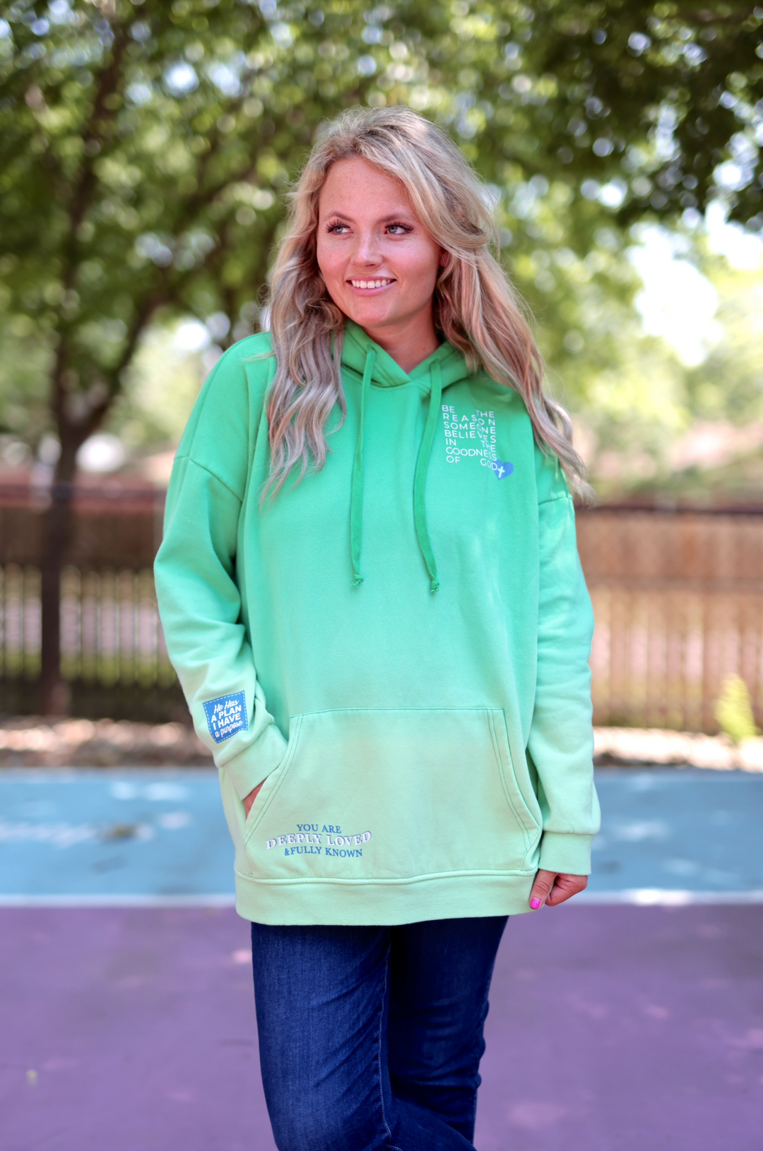 Women’s green ombre hoodie, featuring inspirational quotes. Cozy fabric and relaxed fit for comfort.