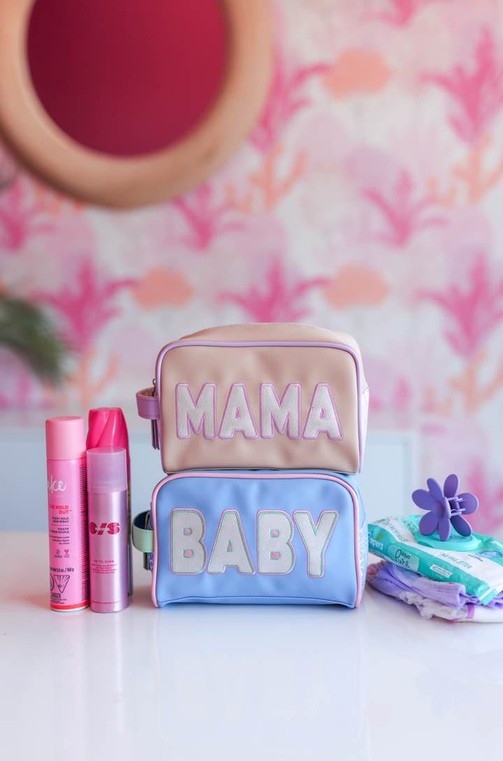 Mama Baby dual cosmetic bag set in pink and blue, made of durable material with stylish lettering.